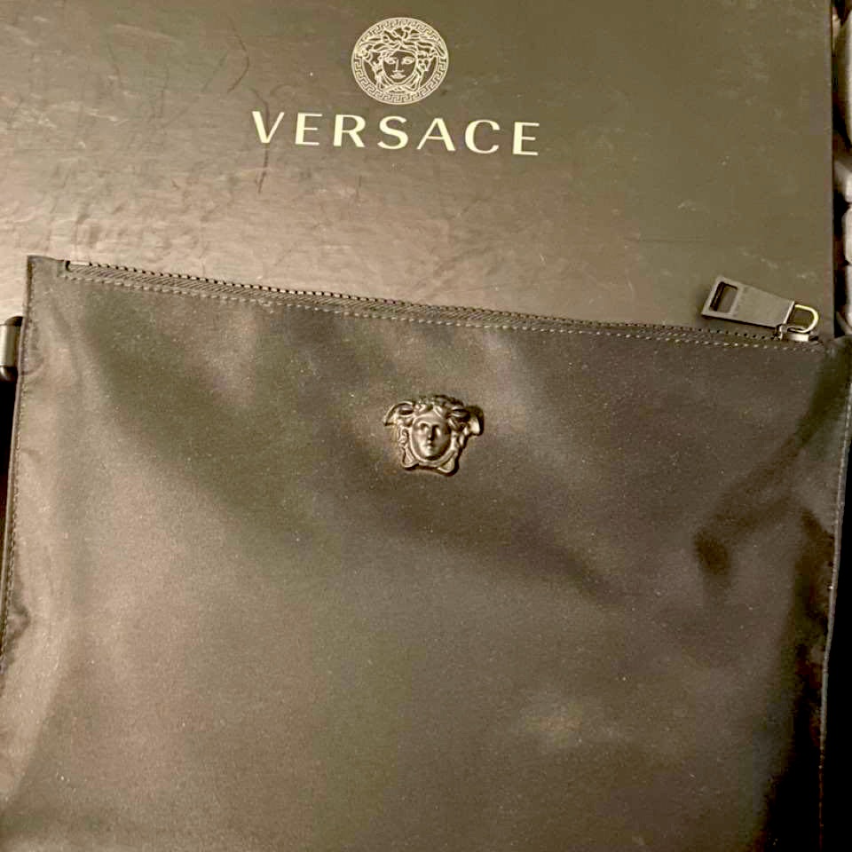 Versace Clutch , In Used Condition . Purchased Online Versace Website